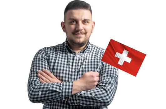 white-guy-holding-a-flag-of-swit white-guy-holding-a-flag-of-swit