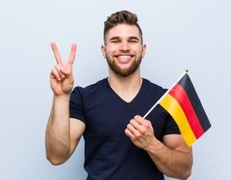 young-caucasian-man-holding-germ young-caucasian-man-holding-germ